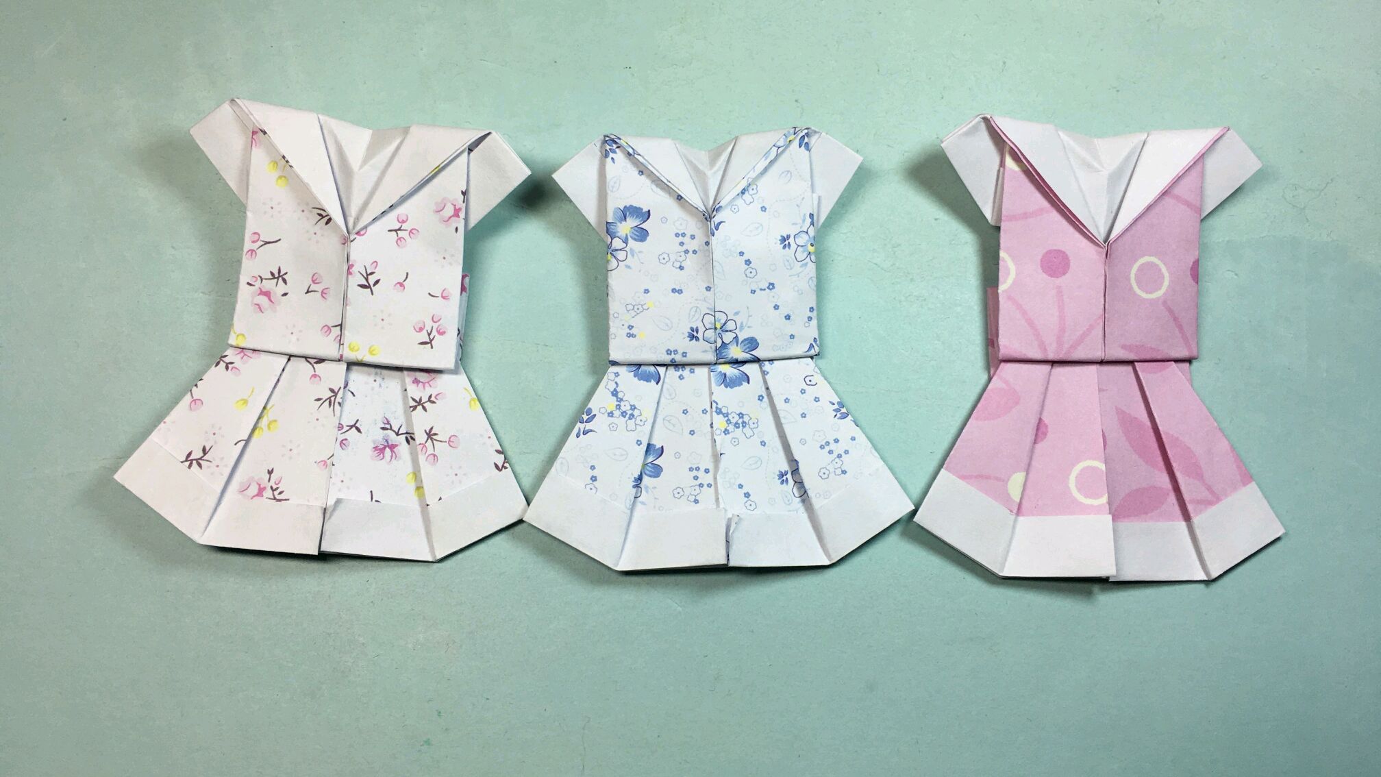 漂亮的折纸连衣裙,几个步骤就能折好,小女孩们都很喜欢!