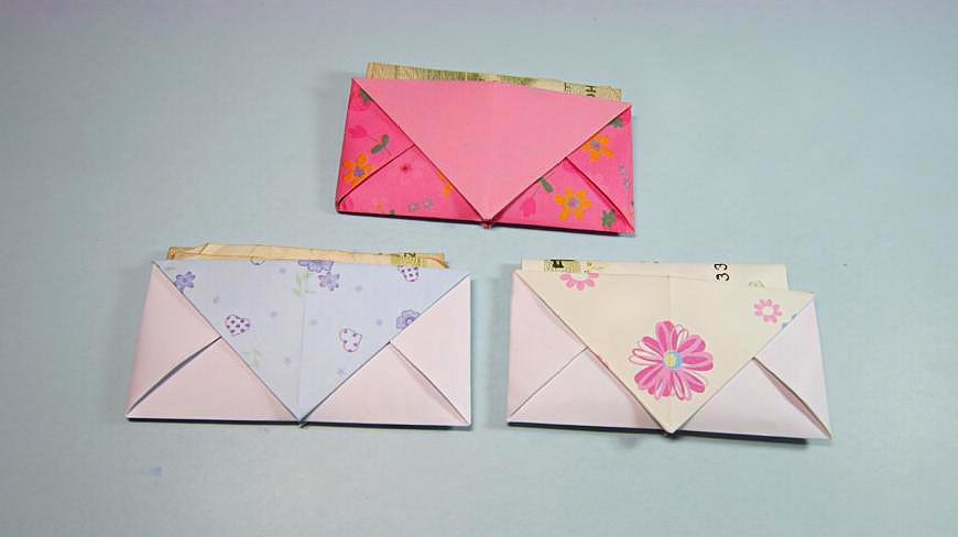 1折纸零钱包:选用彩纸,首先基础折叠,主要用到局部粘贴.