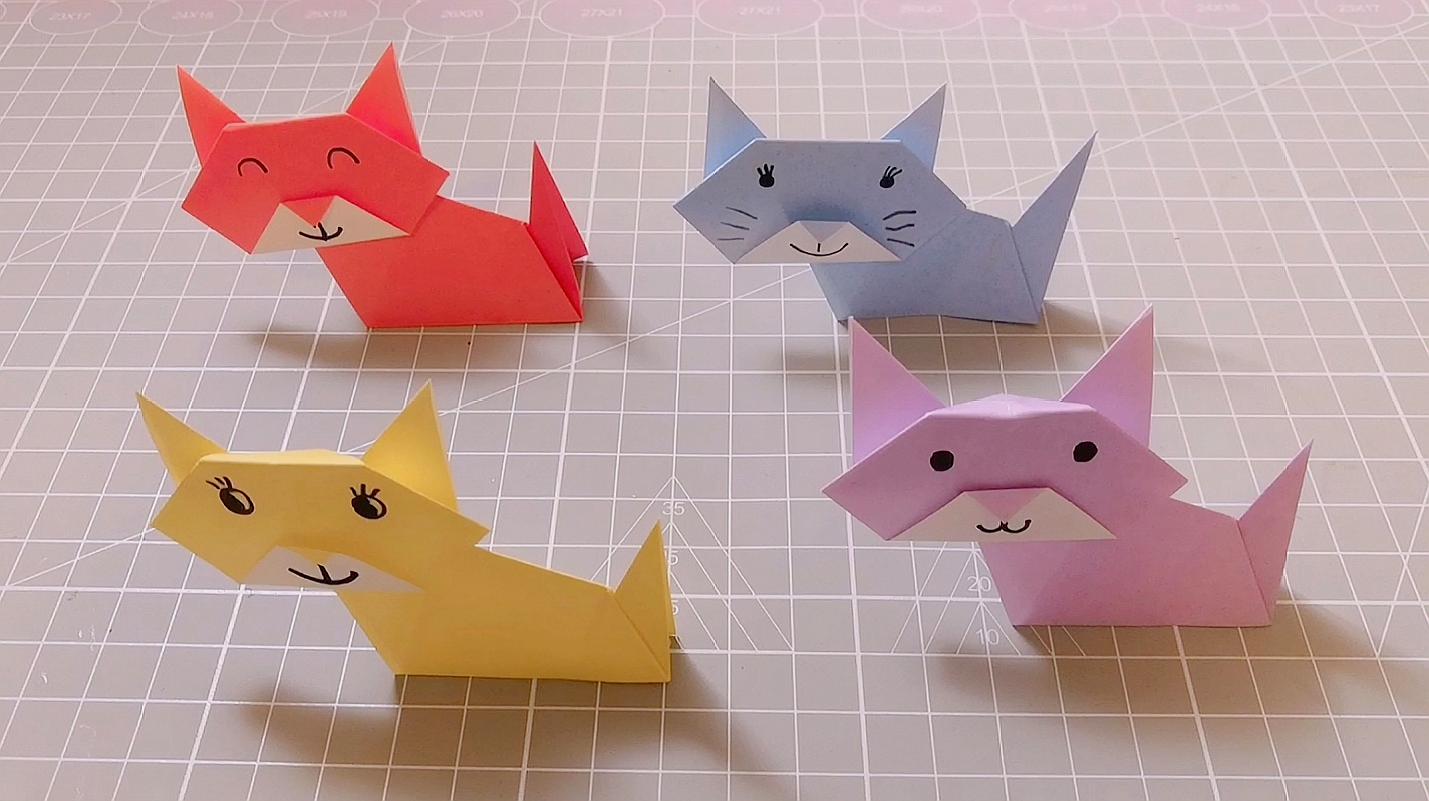 幼儿手工折纸小猫咪,折法非常简单,是组合而成的
