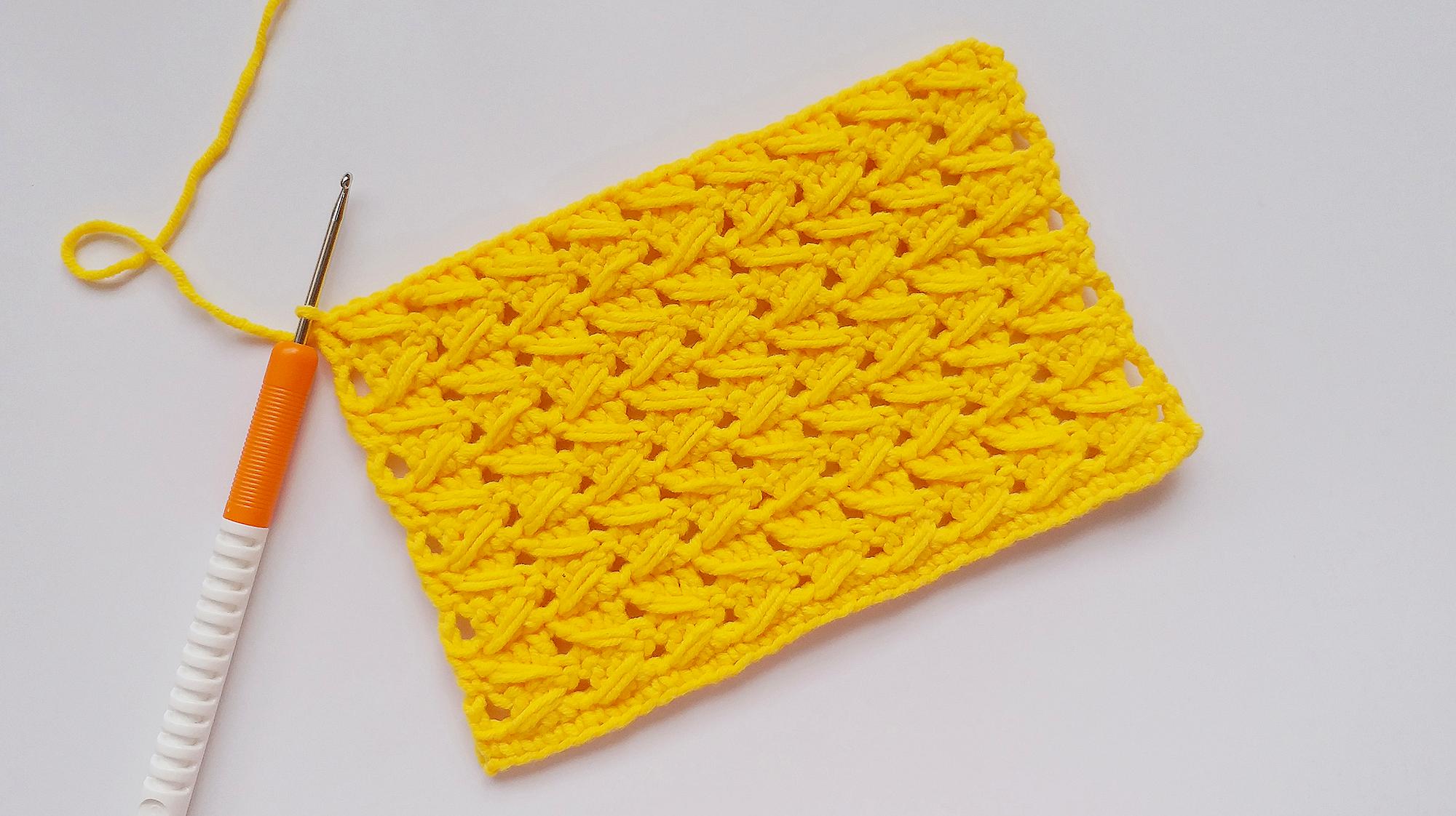 23  来源:好看视频-钩针编织 简单大方的镂空菱形花样 可以做围巾毛衣